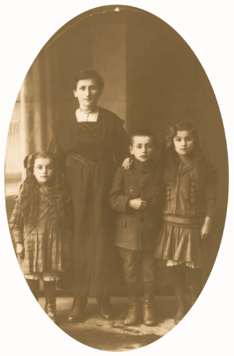 The mother of Richard Deane Taylor, Minnie Tuchschneider posing with her three oldest children in 1920