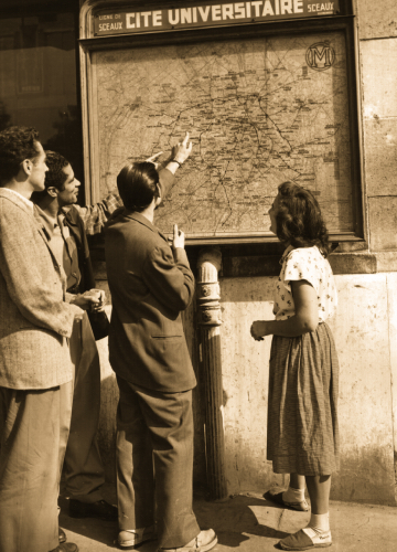 Posing at an outdoor subway map.
